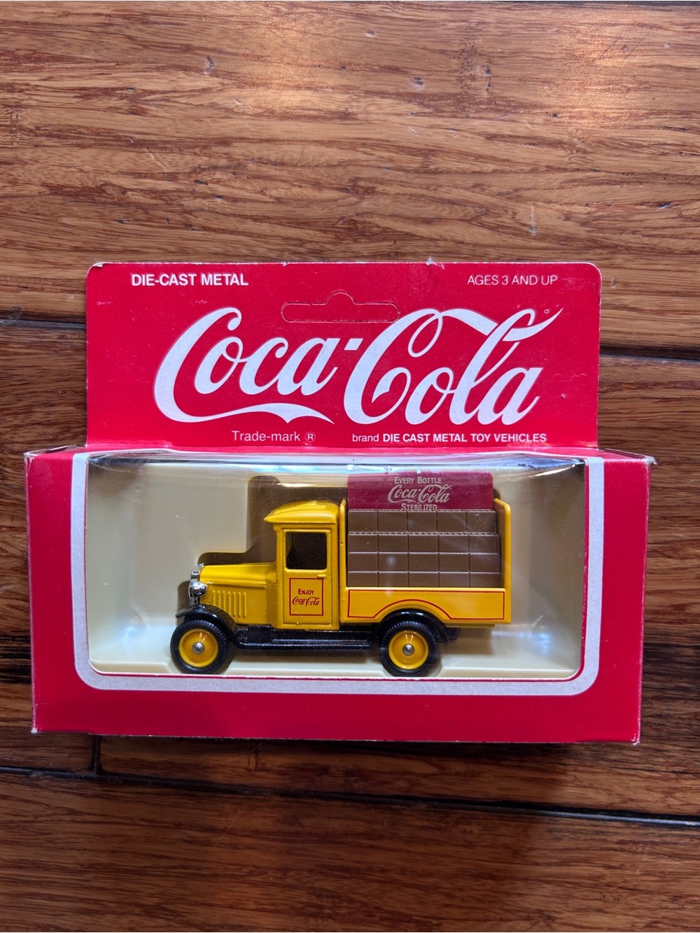 Vintage Coca-Cola die cast metal vehicle. “Enjoy Coca Cola”.